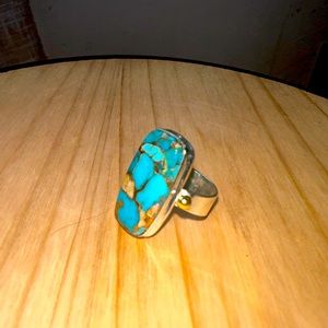 Genuine turquoise $ sterling silver ring